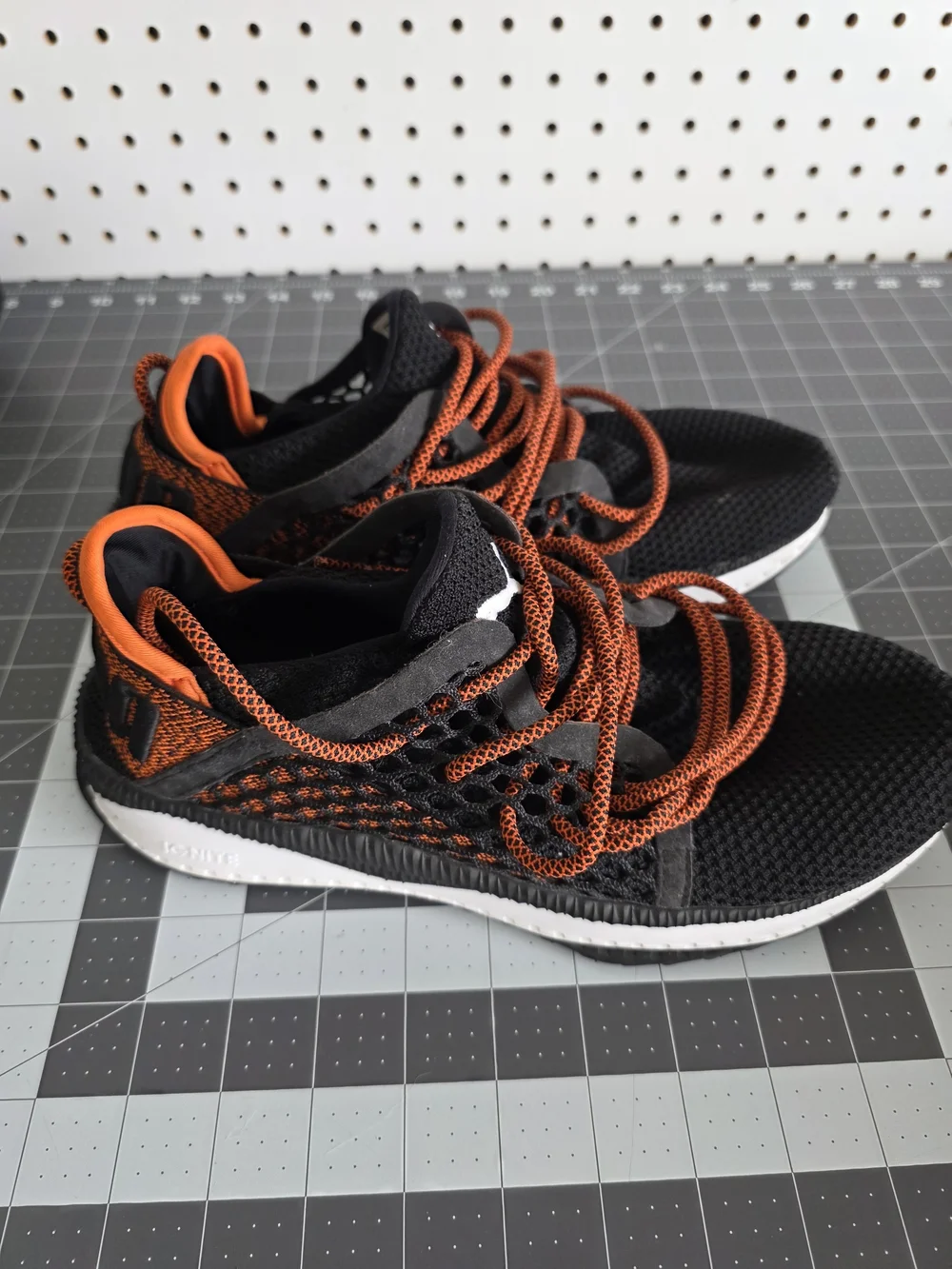 Puma Black Knit Sneakers with Orange Accents